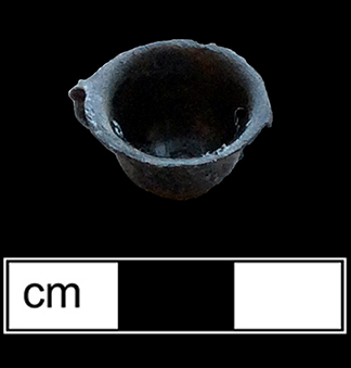 Cast copper alloy or Britannia metal (pewter alloy) toy tea cup. 1.5cm x 1.5cm - from 18BC27.